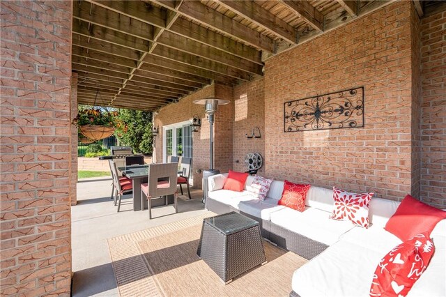 view of patio / terrace featuring an outdoor living space and outdoor dining space