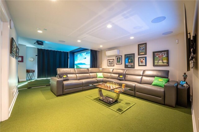 carpeted home theater room with an AC wall unit and recessed lighting