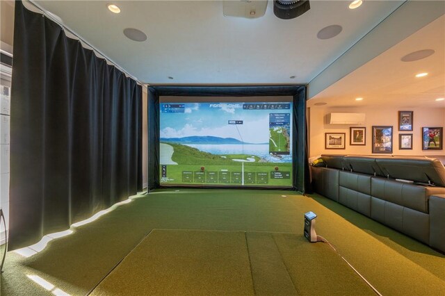 carpeted home theater room with an AC wall unit, recessed lighting, and golf simulator