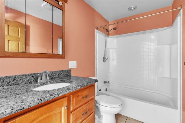 bathroom featuring vanity, tile patterned flooring, shower / bath combination, and toilet