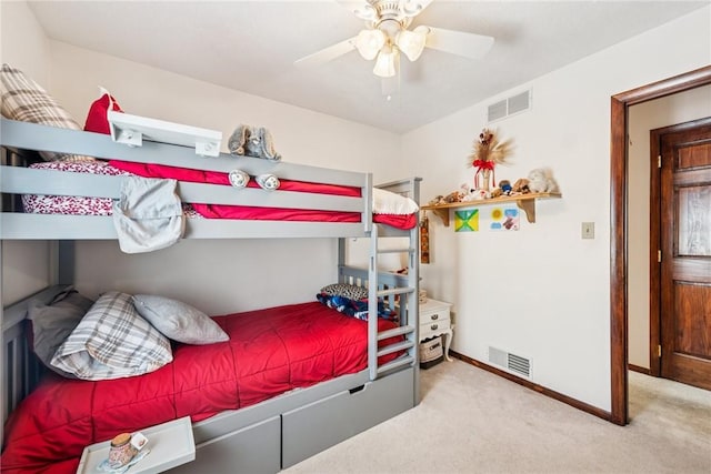 bedroom with visible vents, carpet flooring, baseboards, and a ceiling fan