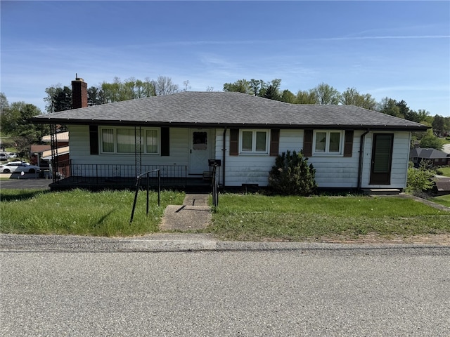 412 Helen Ave, Monessen, PA 15062 - view of front of property with roof with shingles, covered porch, a chimney, and a front yard