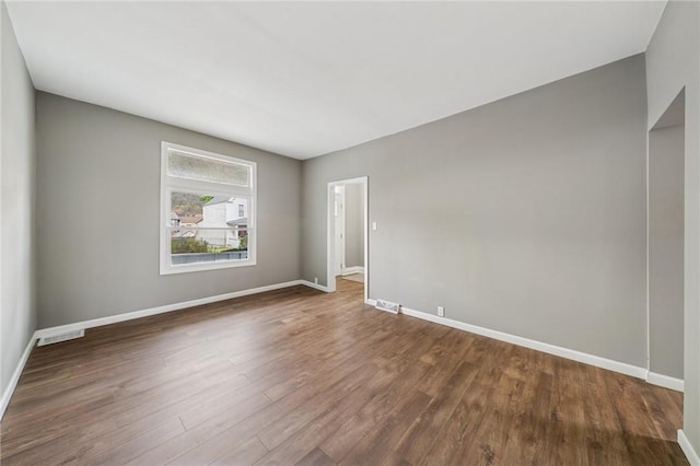 544 4th Ave, New Kensington, PA 15068 - unfurnished room with baseboards, wood finished floors, and visible vents