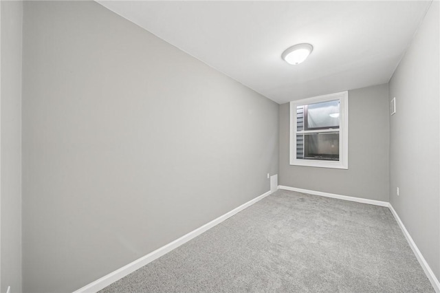 544 4th Ave, New Kensington, PA 15068 - empty room with baseboards and carpet flooring
