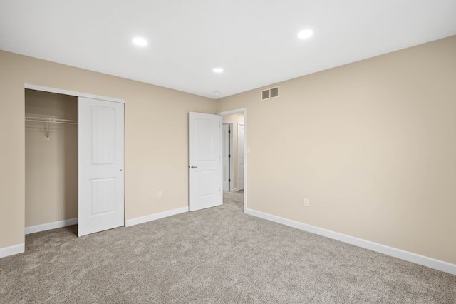 1809 Coursin St, Mckeesport, PA 15132 - unfurnished bedroom with visible vents, a closet, baseboards, recessed lighting, and carpet