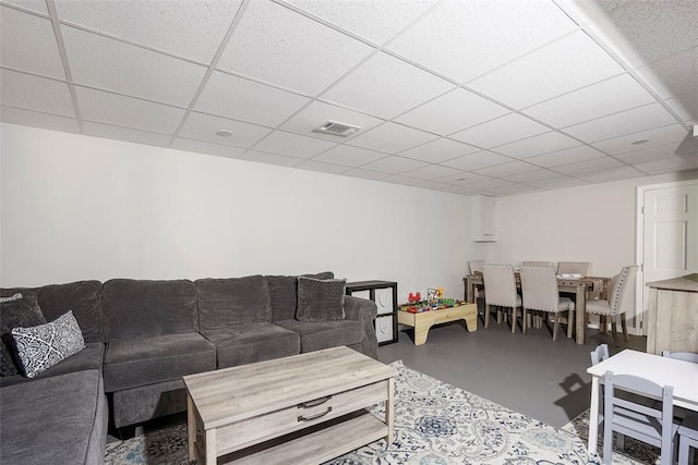 607 Hickory Dr, Hopewell Twp Bea, PA 15001 - living area with concrete floors, visible vents, and a drop ceiling