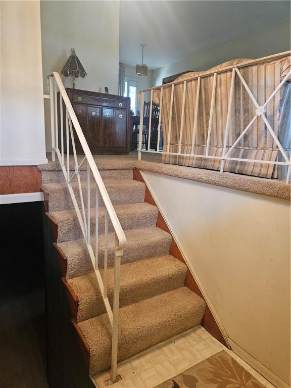 staircase with baseboards