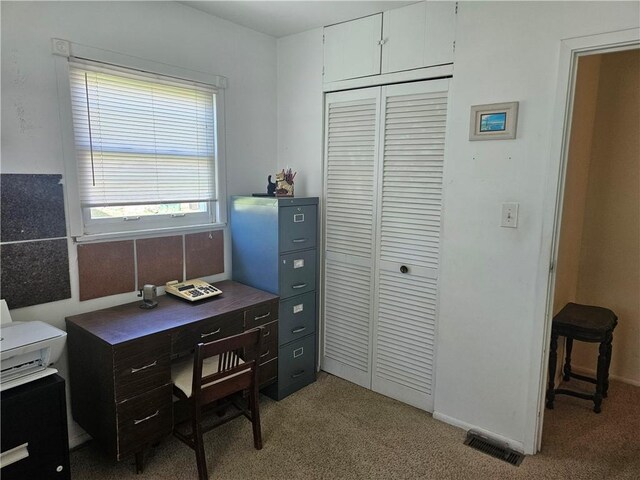 carpeted office featuring visible vents