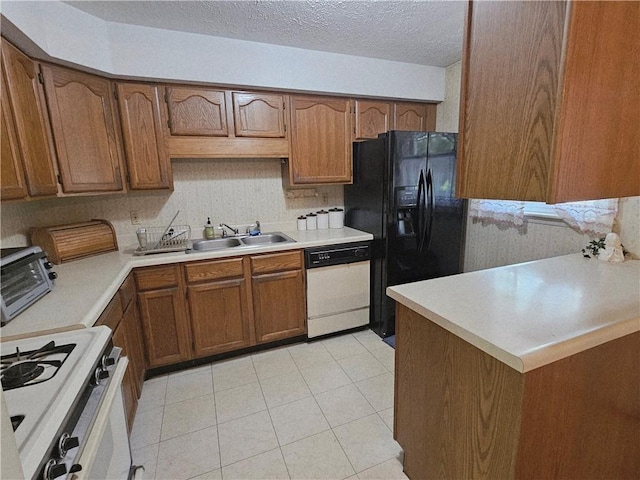 317 Chestnut Dr, Center Twp But, PA 16001 - kitchen featuring white appliances, brown cabinetry, light countertops, light tile patterned flooring, and a sink