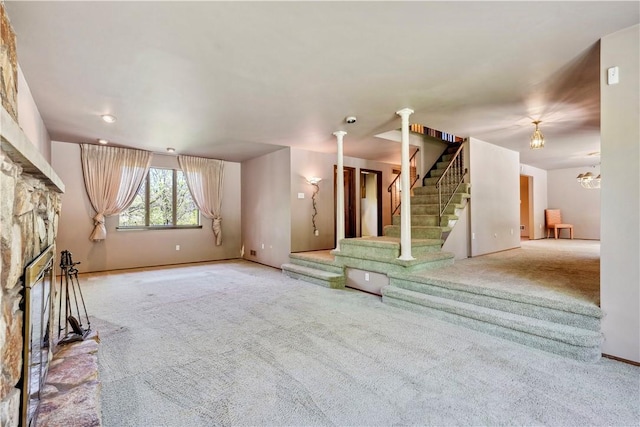 2408 Georgette St, Overbrook, PA 15234 - unfurnished living room featuring carpet, baseboards, stairway, and a fireplace