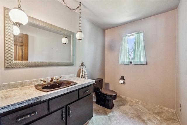 2408 Georgette St, Overbrook, PA 15234 - bathroom with vanity, baseboards, and toilet