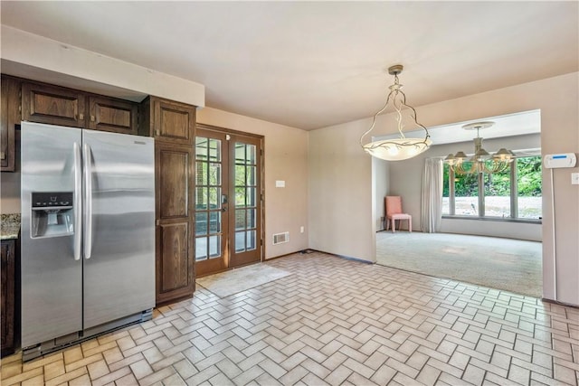 2408 Georgette St, Overbrook, PA 15234 - kitchen featuring a wealth of natural light, french doors, stainless steel refrigerator with ice dispenser, and visible vents