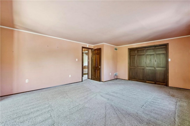 2408 Georgette St, Overbrook, PA 15234 - unfurnished bedroom featuring light colored carpet, ornamental molding, visible vents, and a closet
