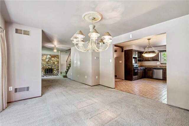 2408 Georgette St, Overbrook, PA 15234 - interior space with a notable chandelier, visible vents, light carpet, and baseboards