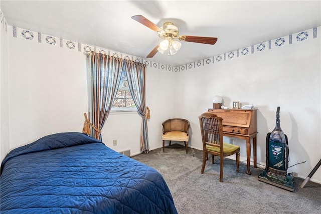 carpeted bedroom with baseboards and ceiling fan