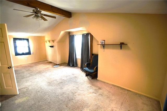 bonus room with a ceiling fan, carpet flooring, baseboards, and lofted ceiling with beams