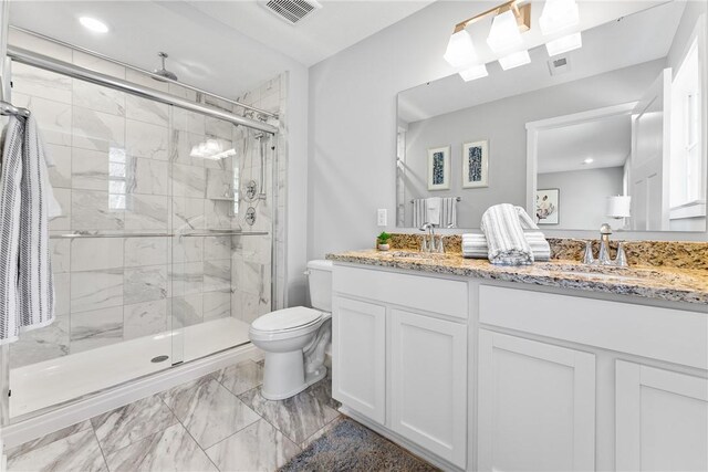 175 Lockheed Dr, Moon/Crescent Twp, PA 15108 - bathroom featuring toilet, visible vents, a sink, and marble finish floor
