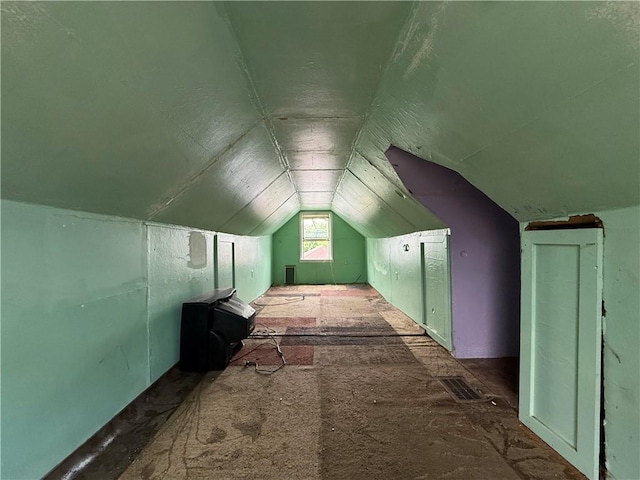 bonus room featuring vaulted ceiling