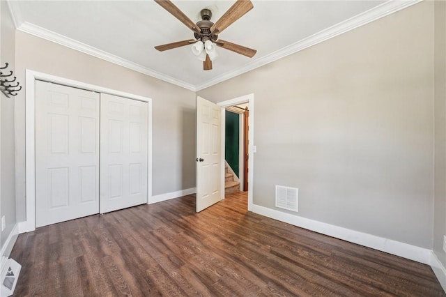 5672 6th St, Baldwin Boro, PA 15236 - unfurnished bedroom with crown molding, baseboards, wood finished floors, visible vents, and a closet