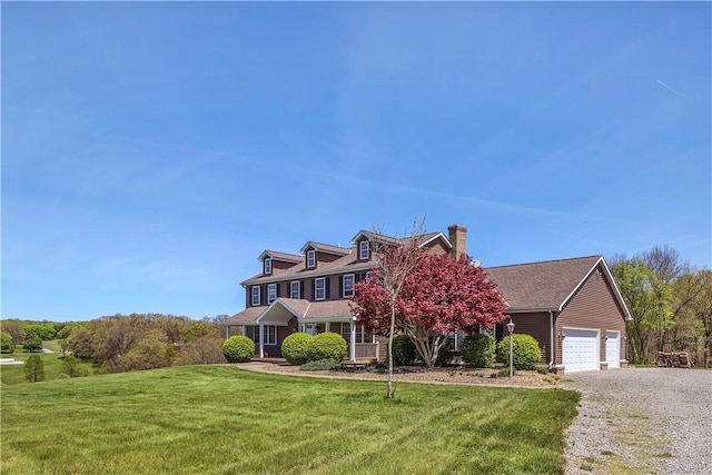 view of front of property featuring a chimney and a front lawn