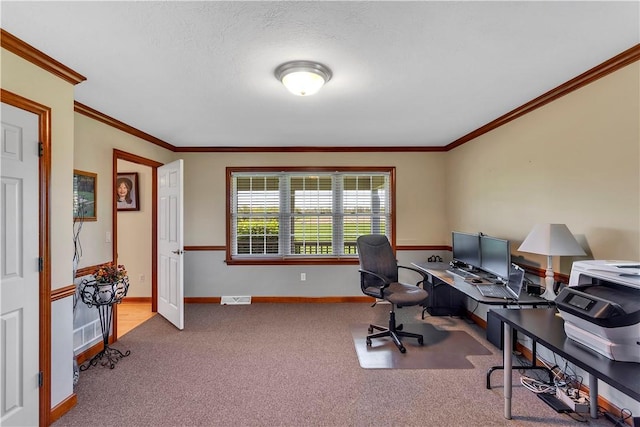 carpeted home office with baseboards, ornamental molding, and visible vents