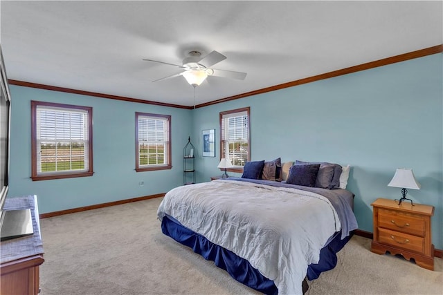 bedroom with crown molding, a ceiling fan, baseboards, and light colored carpet