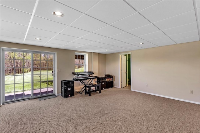 interior space featuring carpet flooring, recessed lighting, baseboards, and a paneled ceiling