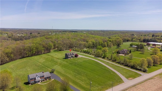 aerial view featuring a view of trees