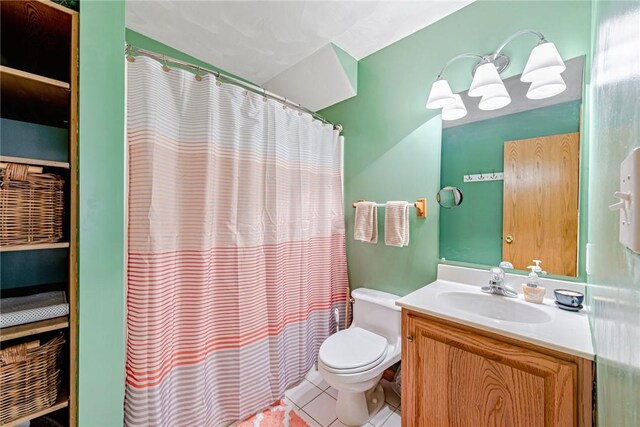 full bath with tile patterned flooring, a shower with curtain, toilet, and vanity