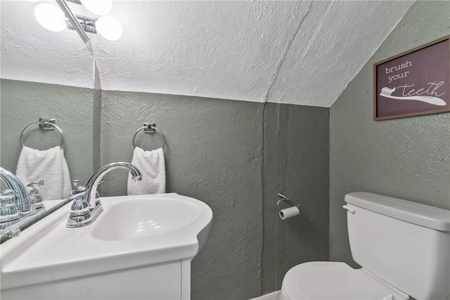 244 S Rebecca St, Saxonburg Boro, PA 16056 - bathroom featuring vanity, a textured wall, and toilet