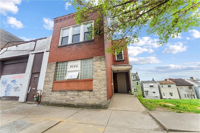 4566 Penn Ave, Bloomfield, PA 15224 - view of front facade with brick siding and stone siding