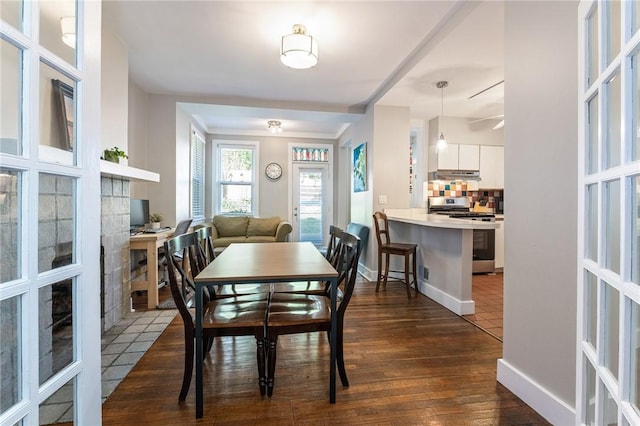 4004 Windsor St, Greenfield, PA 15217 - dining room with baseboards, french doors, and dark wood-type flooring
