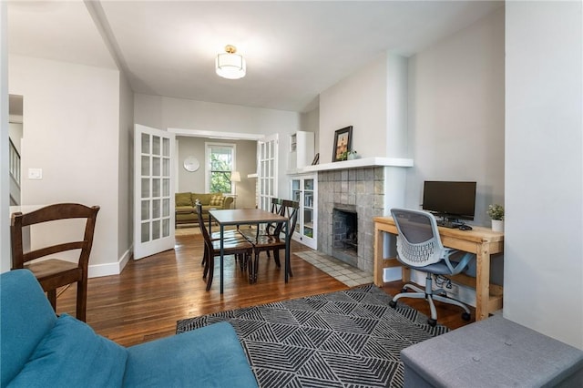 4004 Windsor St, Greenfield, PA 15217 - office featuring baseboards, wood finished floors, and a fireplace
