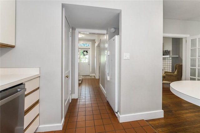 4004 Windsor St, Greenfield, PA 15217 - corridor featuring dark tile patterned floors and baseboards