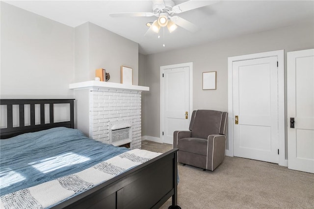 4004 Windsor St, Greenfield, PA 15217 - bedroom with a ceiling fan, light carpet, and a fireplace