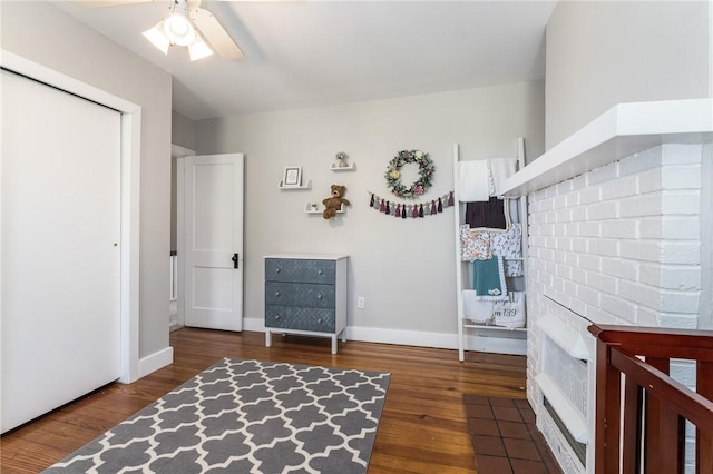 4004 Windsor St, Greenfield, PA 15217 - bedroom featuring baseboards, ceiling fan, a fireplace, and wood finished floors