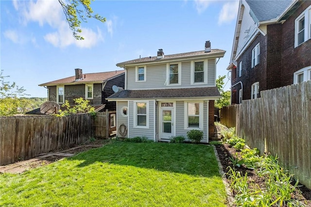 4004 Windsor St, Greenfield, PA 15217 - back of house featuring a lawn, a chimney, and a fenced backyard