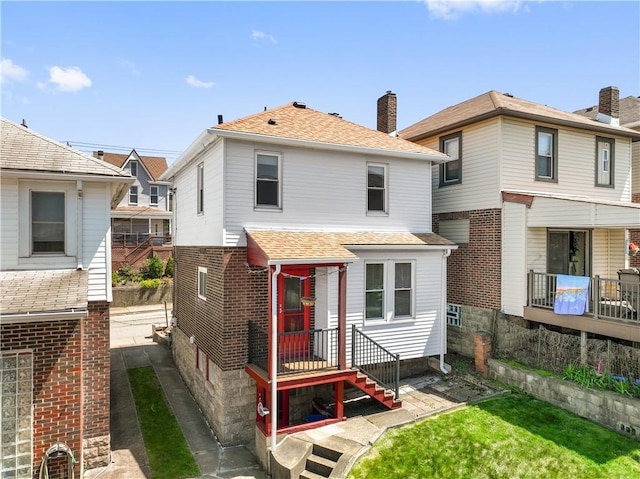 4128 Winterburn, Greenfield, PA 15207 - view of front of property with brick siding, a chimney, and roof with shingles