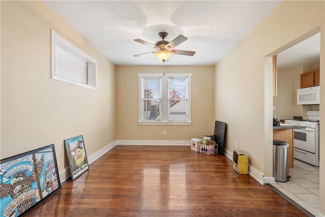 4128 Winterburn, Greenfield, PA 15207 - unfurnished room featuring a ceiling fan, baseboards, and light wood-style floors
