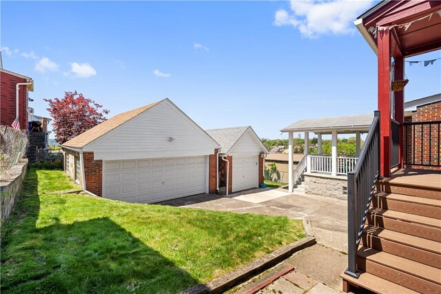 4128 Winterburn, Greenfield, PA 15207 - view of yard featuring a detached garage and an outbuilding
