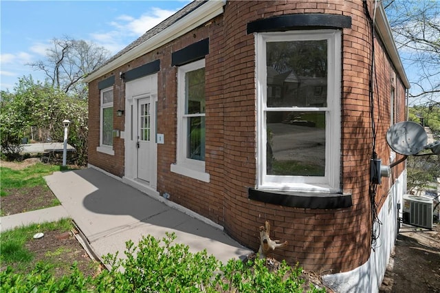 205 Berkley Ave, Forest Hills Boro, PA 15221 - view of home's exterior featuring central AC and brick siding
