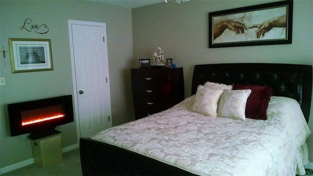bedroom featuring baseboards