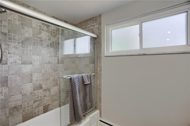 full bath with combined bath / shower with glass door