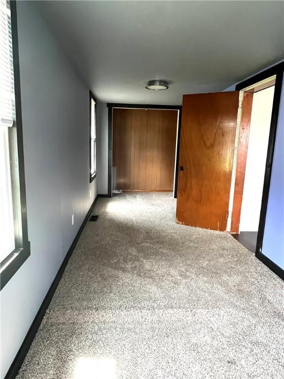 420 Church St, Harrisville Boro, PA 16038 - carpeted spare room with visible vents and baseboards