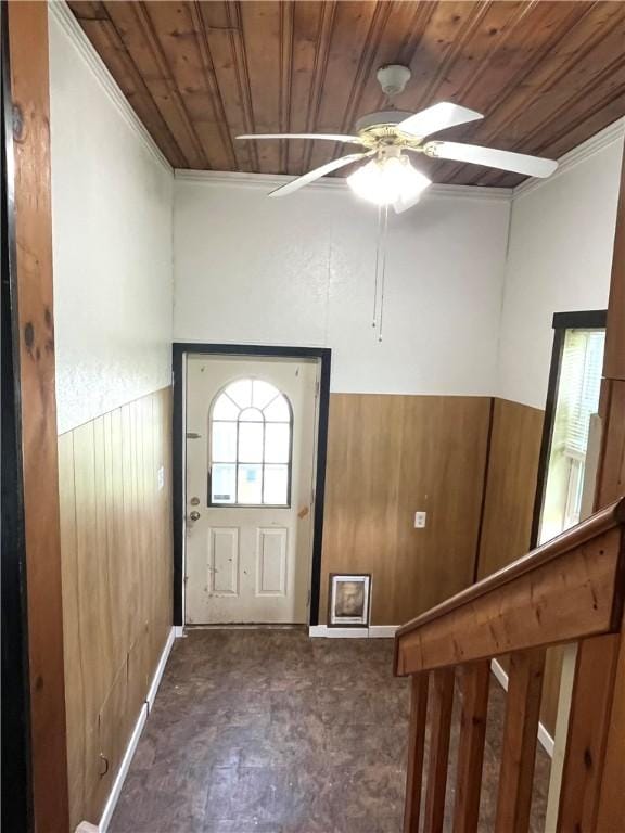 420 Church St, Harrisville Boro, PA 16038 - entryway featuring a ceiling fan, wood ceiling, a wainscoted wall, and wooden walls