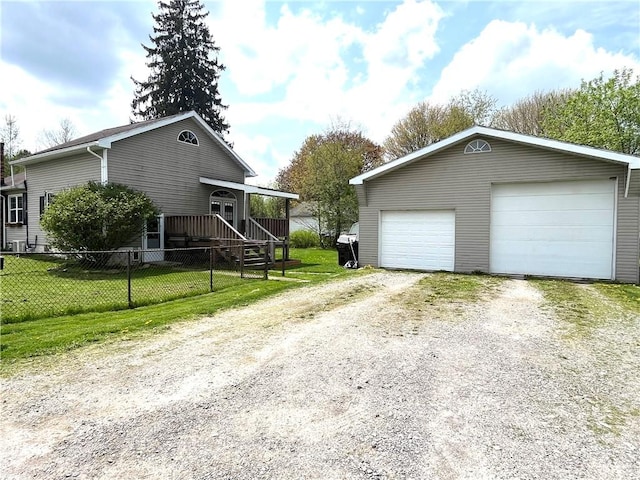 420 Church St, Harrisville Boro, PA 16038 - exterior space with fence, an outdoor structure, a lawn, and a garage