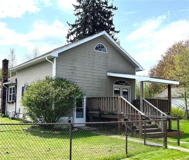 420 Church St, Harrisville Boro, PA 16038 - view of front facade with fence, central air condition unit, and a front lawn