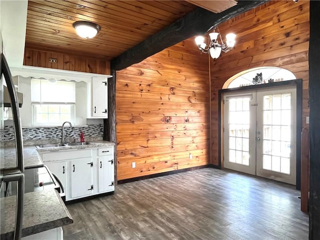 420 Church St, Harrisville Boro, PA 16038 - kitchen with an inviting chandelier, wood walls, wooden ceiling, french doors, and a sink