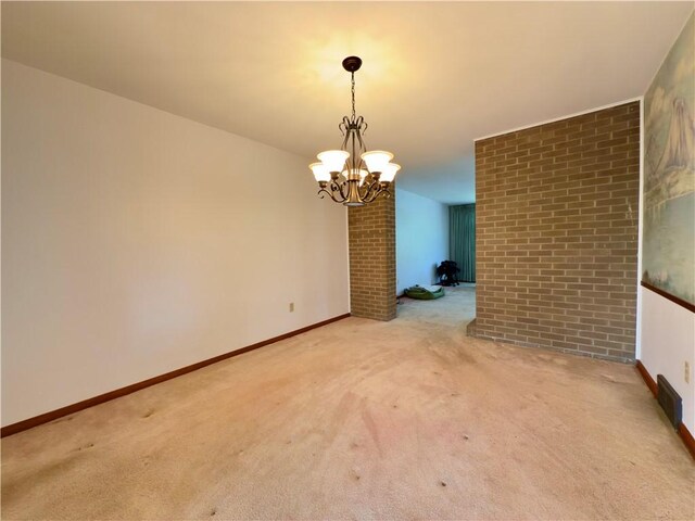 unfurnished room with baseboards, visible vents, carpet, and a notable chandelier