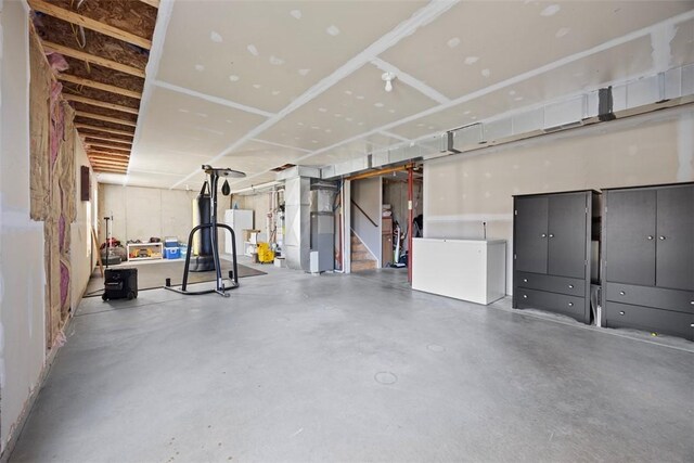 garage featuring heating unit